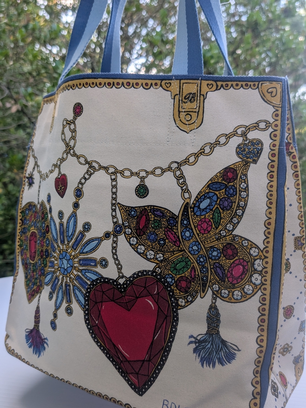 Brighton Cream Tote with Blue Straps and Multicolor Jewel Motif